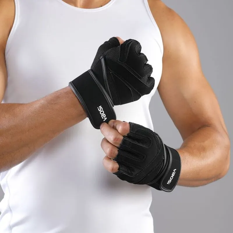 Man wearing black fingerless gym gloves with adjustable wrist straps
