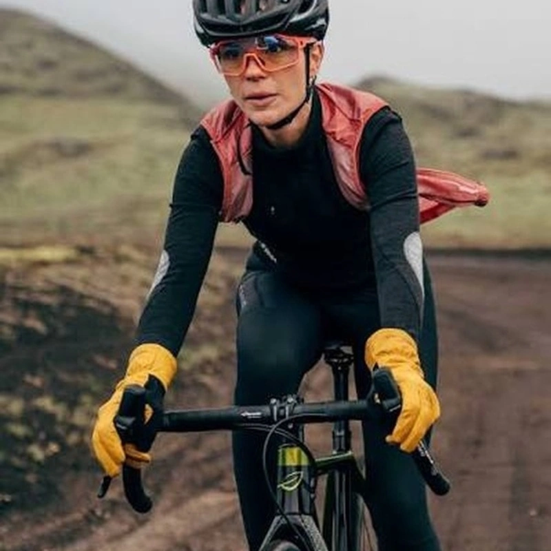 Women wearing yellow custom-made leather cycling gloves