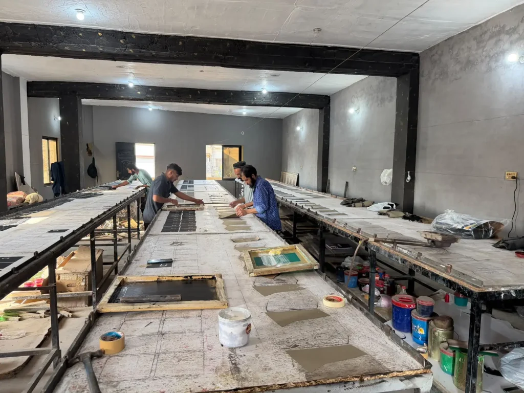 Workers Doing Screen Printing on Gloves Panels in Factory